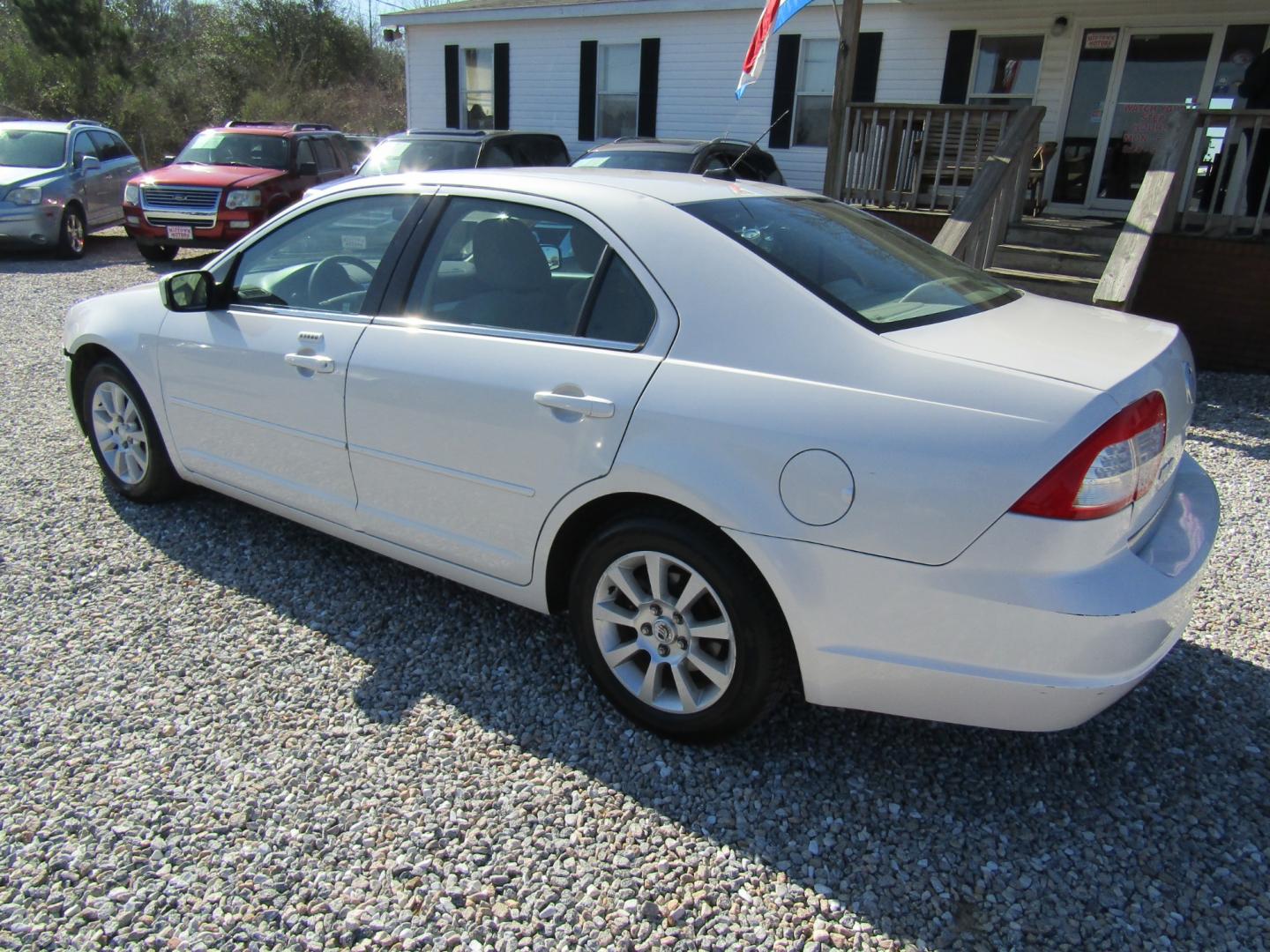 2009 CREAM /Tan Mercury Milan I4 (3MEHM07Z19R) with an 2.3L L4 DOHC 16V engine, Automatic transmission, located at 15016 S Hwy 231, Midland City, AL, 36350, (334) 983-3001, 31.306210, -85.495277 - Photo#5